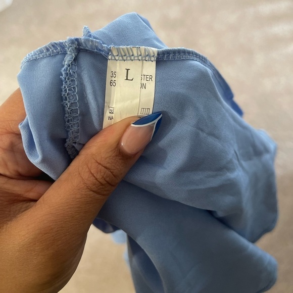 Statement making blue blouse size large - Picture 2 of 5